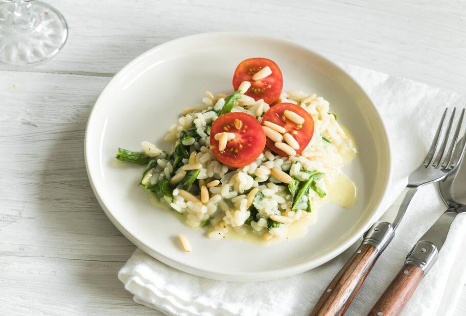 Risotto mit Rucola und Tomaten