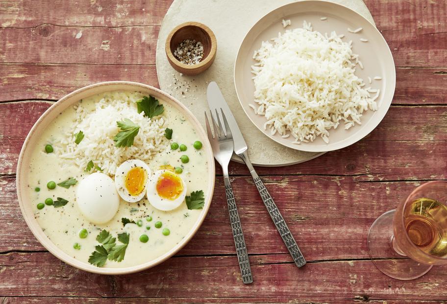 Eier in Senfsauce mit Erbsen