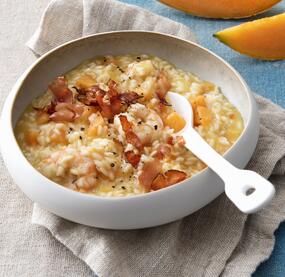 Melonenrisotto mit Garnelen und Speck