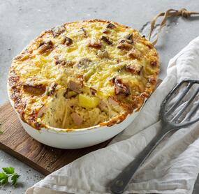 Knusprig überbackener Leberkäsauflauf